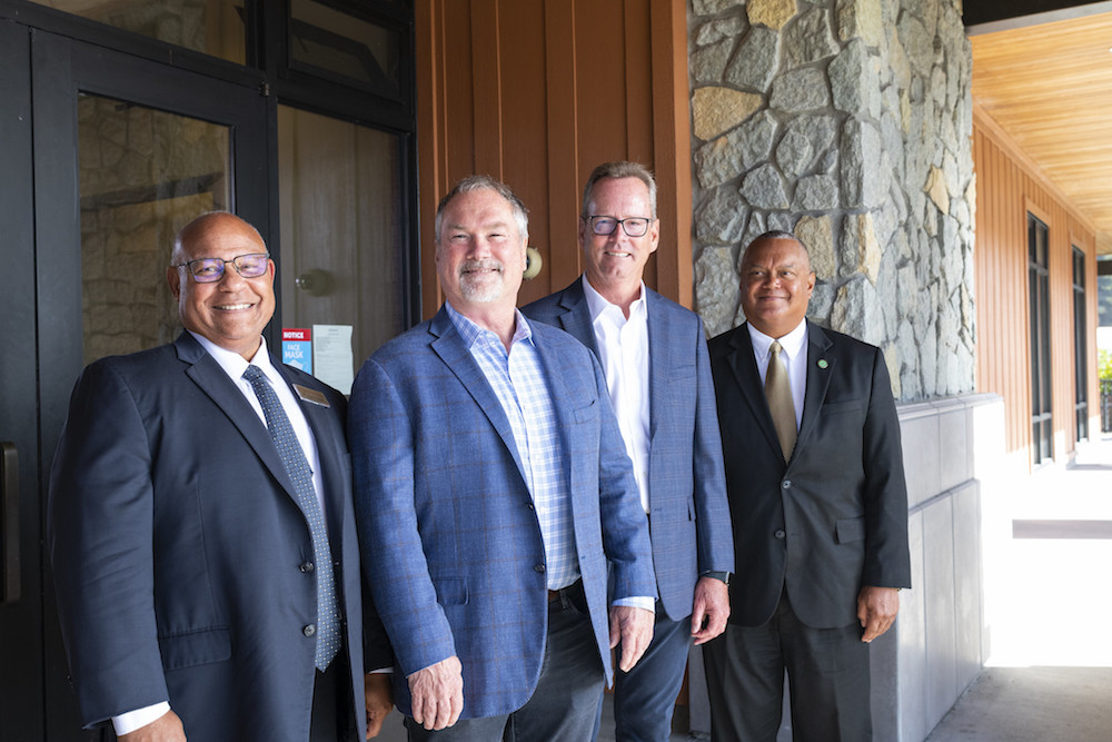 Front to back (College of the Redwoods President Keith Flamer, alumni and Lost Coast Ventures founders Dan Phillips and John Ballard, and Cal Poly Humboldt President Tom Jackson, Jr.