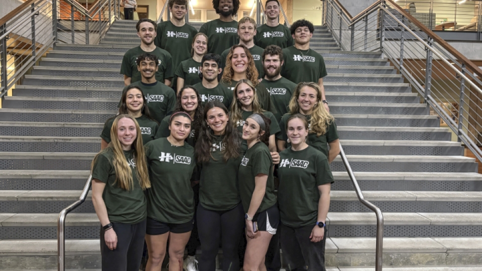 Student Athlete Advisory Club on the stairs in Lumberjack Arena.