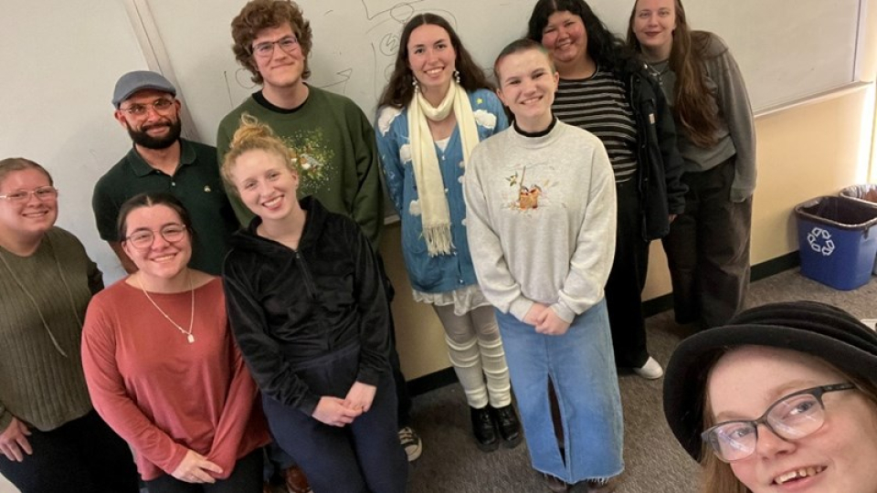 A selfie group photo of 10 SOAR club members.
