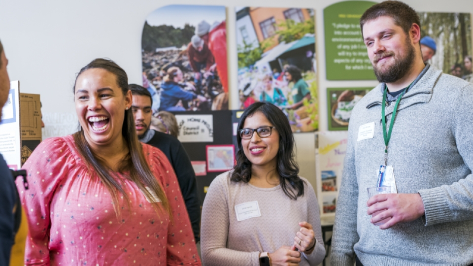 Three sociology students smiling.