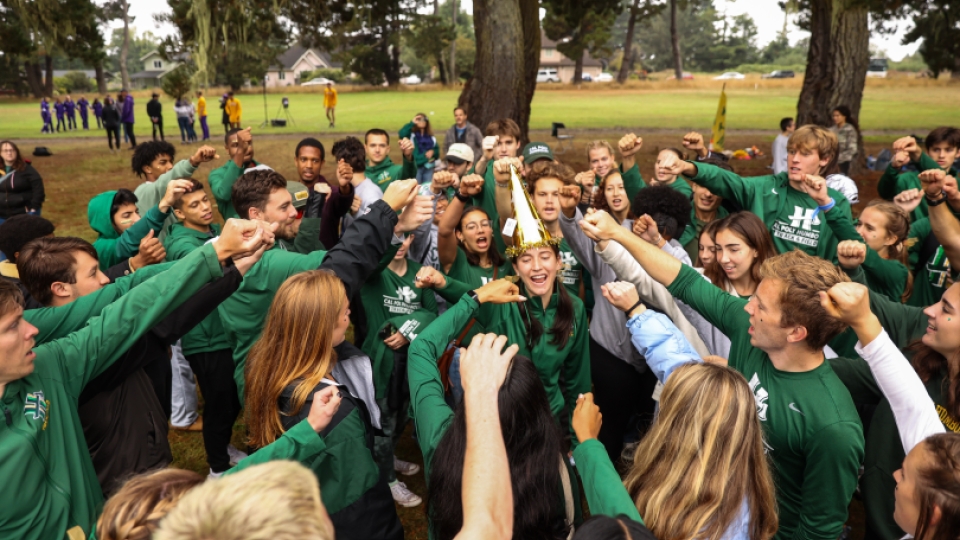 The men and women's teams cheering before a race.