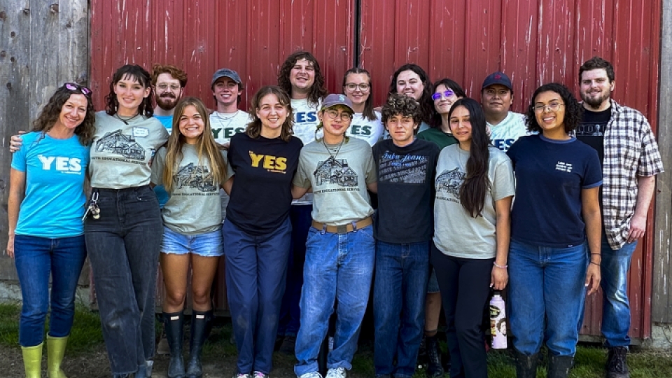 A group of Y.E.S volunteers with their arms around eachother.